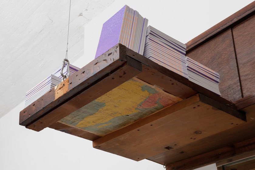 phantom. menace., 2020, 2021, 2022, 2023,  (detail) Barbershop fittings, mirror, digital video on monitor, books  71 × 131 × 12 in. (180.34 × 332.74 × 30.48 cm)  video: 3:24 minutes, looped